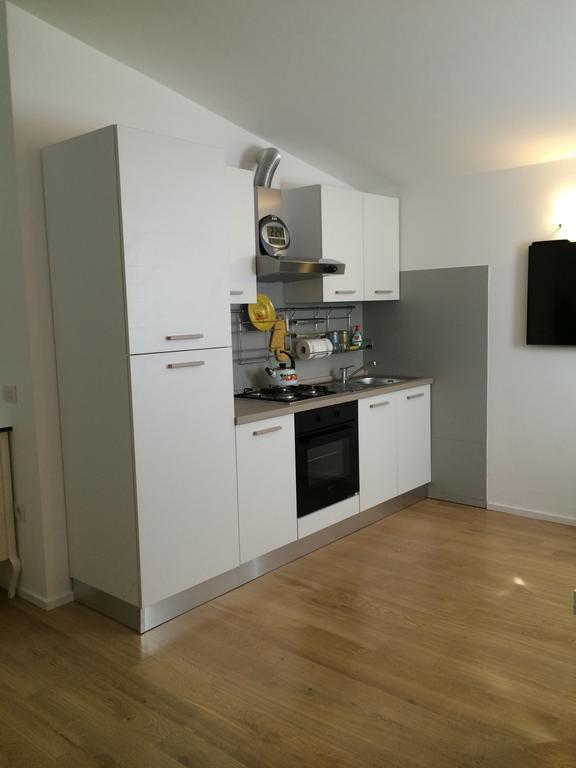 Casina Rosa Apartment Черталдо Стая снимка